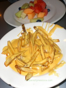Cheese fries and fresh fruits at Burgers & Cupcakes in New York City